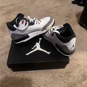 Air Jordan Retro White and Black Sneakers